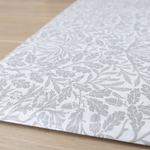 morris & co acorn print close up in neutral grey padded play mat