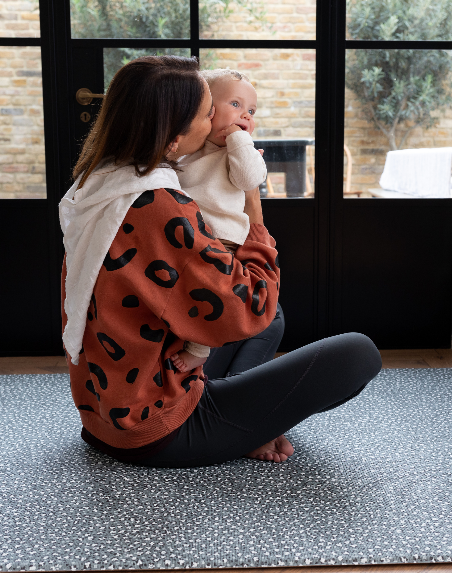 Mom and son enjoy floor play in comfort on the toddler play mat designed for the whole family