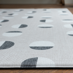 Closer look at the rug like floor mat with a design lead motif and textured surface