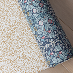 totter + tumble play mat in blackthorn + standen print rolled up reversible double-sided print by william morris & co timeless designs for your family home