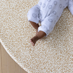 The Standen play mat totter + tumble morris & co collection in round size with baby floor mat, kid-friendly padded area rug that is comfortable, washable and easy to clean